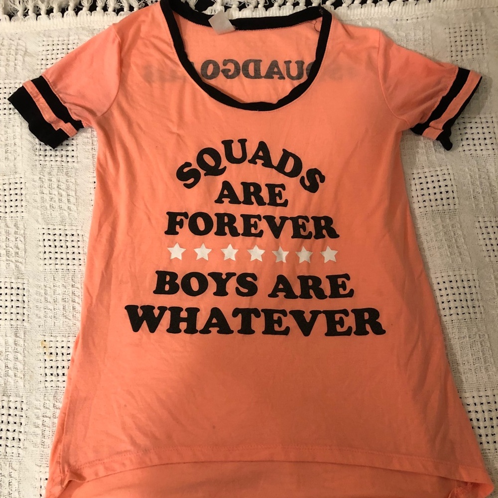 Light weight peach shirt.